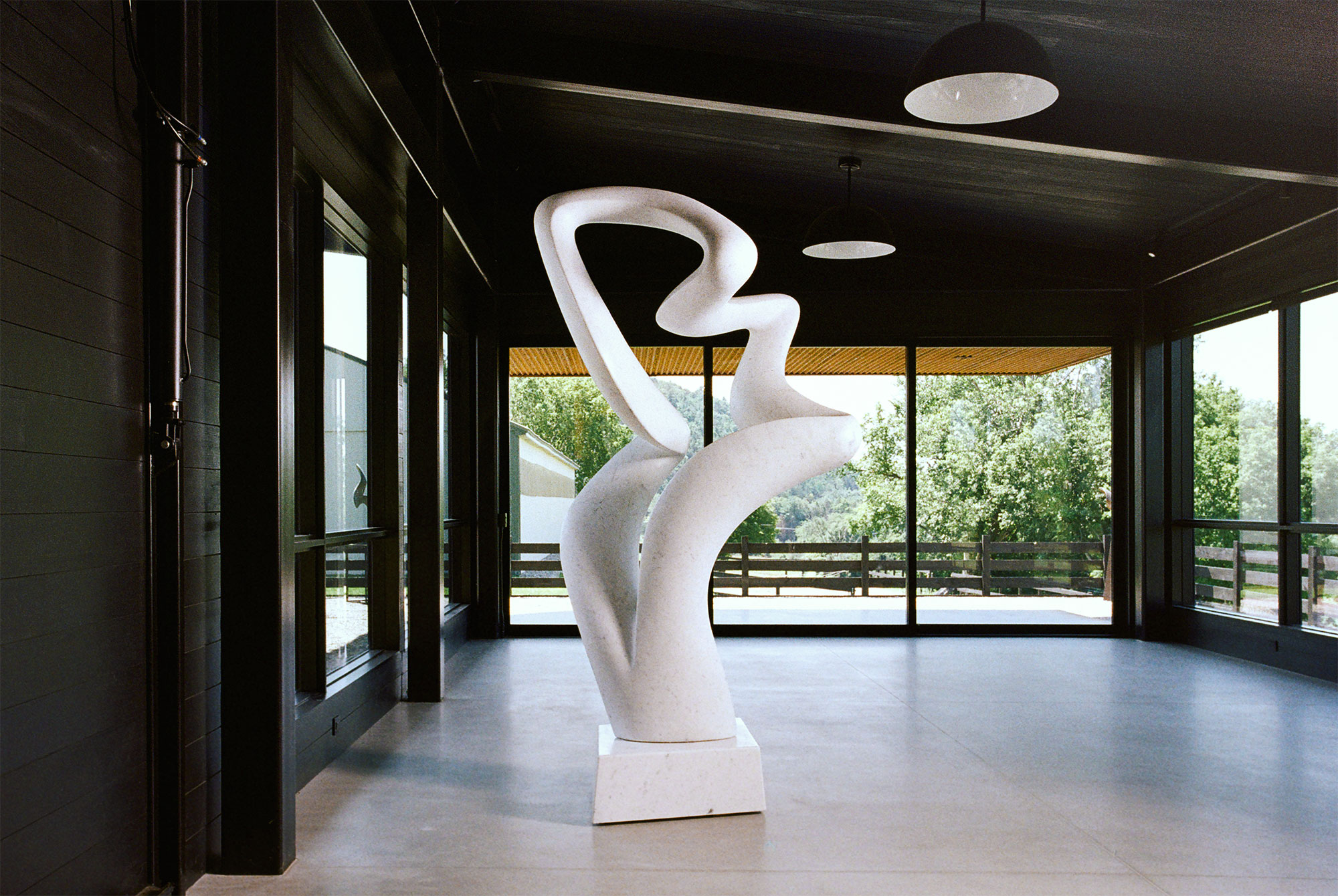 Carrara marble abstract sculpture captured on film in Richard Erdman's studio