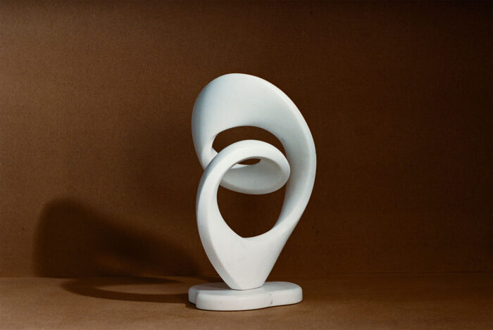 marble sculpture on brown background